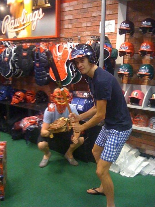 Sam and James trying their hand at Baseball, indoors, in a department store – not ideal